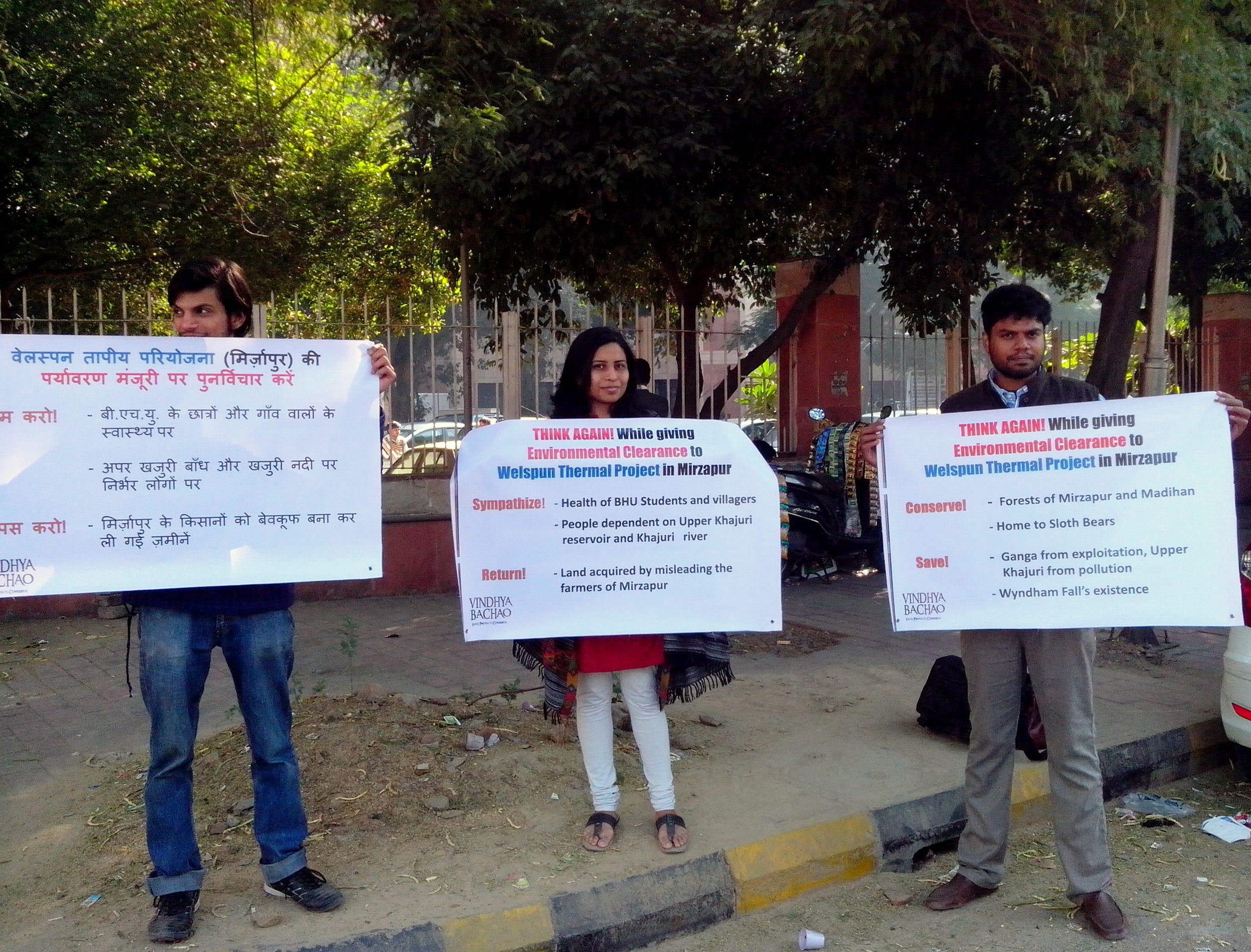Raghav Saraswat, Preeta Dhar and Debadityo Sinha with banners at SCOPE Complex, Delhi